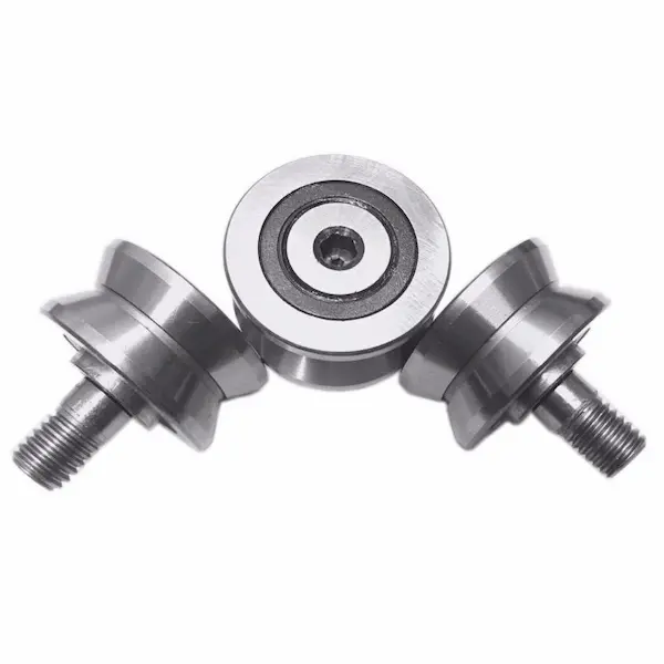 Integral studded V guide wheel and track roller